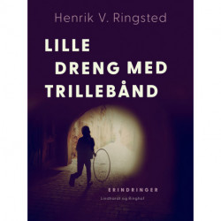 Lille dreng med trillebånd