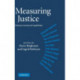 Measuring Justice: Primary Goods and Capabilities