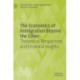 The Economics of Immigration Beyond the Cities: Theoretical Perspectives and Empirical Insights