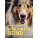 Børn holder hund