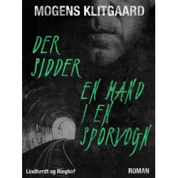 Der sidder en mand i en sporvogn