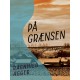 På grænsen
