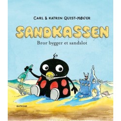 Sandkassen. Bror bygger et sandslot
