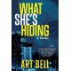 What She's Hiding: A Thriller